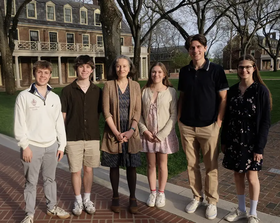 Students posing with author Ruth Franklin.
